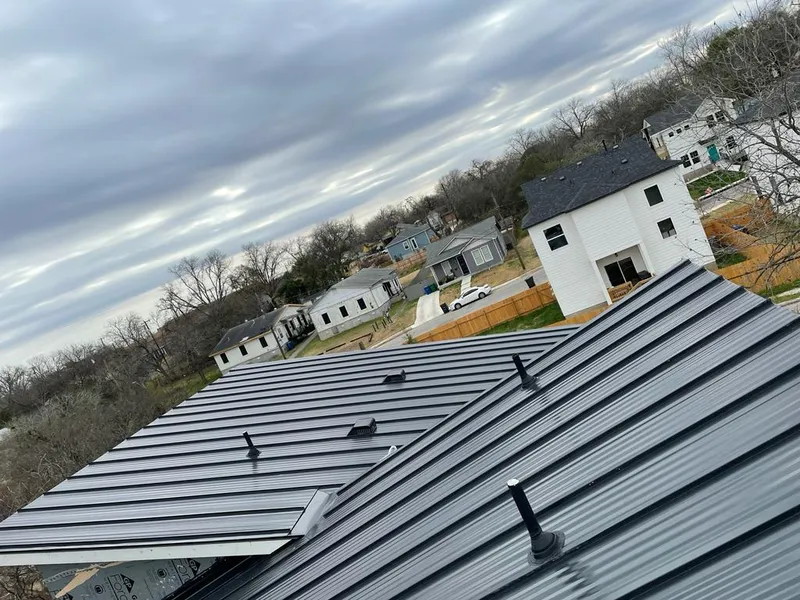 Standing seam metal roof panels with vents for Skylight Repair in Olney